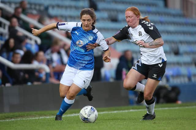 Action from Posh Women v Hashtag United
