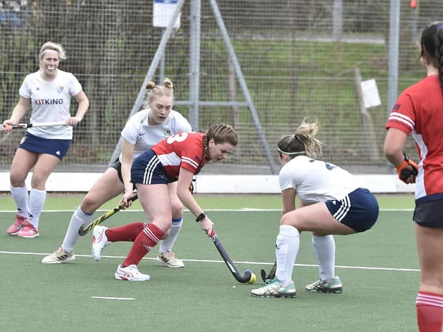Action from City of Peterborough Ladies (red) v Loughborough at Bretton Gate. Photo David Lowndes.