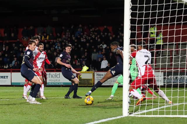 Ricky-Jade Jones of Peterborough United scores the equalising goal against Stevenage. Photo Joe Dent/theposh.com