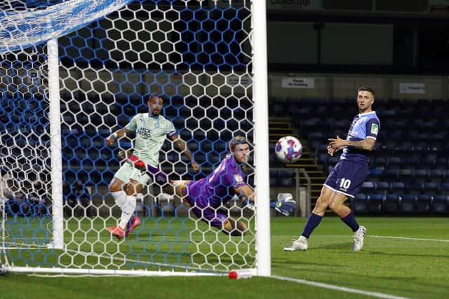 Jonson Clarke-Harris of Peterborough United scores the equalising goal against Wycombe Wanderers. Photo: Joe Dent/theposh.com.