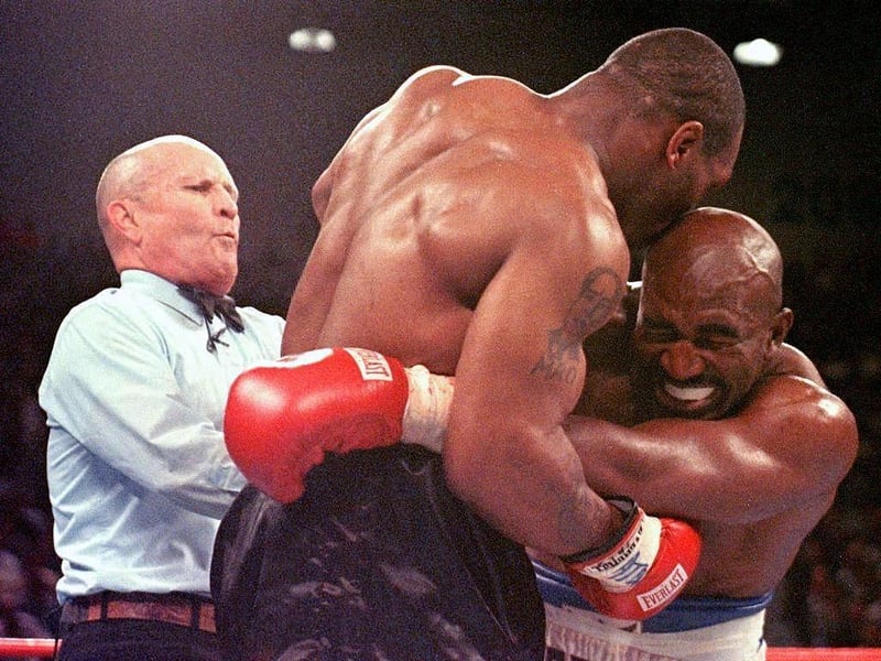 The heavyweights met in 1997. The bout had a bad-tempered start after Holyfield caught Tyson with a headbutt. Iron Mike's reaction was to bite a chunk out of his opponent's ear, earning a round 3 loss, a $3 million fine and a disqualification from boxing.