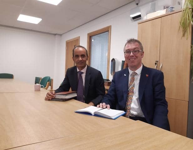 Cllr Mohammed Farooq (left) is Peterborough City Council's new leader, while Cllr John Howard (right) is its new deputy leader and cabinet member for finance