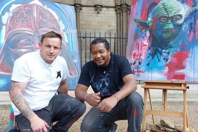 Nathan Murdoch (left) and Tony Nero (right) with their completed works of art. Credit: Paul Stainton.
