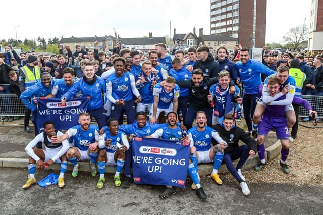 Posh celebrate promotion after a draw against Lincoln in 2021. Photo: Joe Dent.