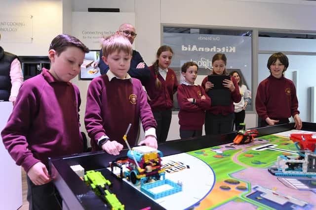 Elton C of E primary school pupils with their robot.
