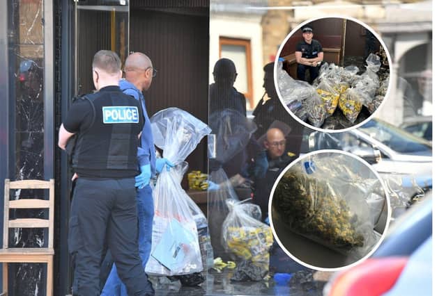 Officers on one of the raids today, and some of the items seized