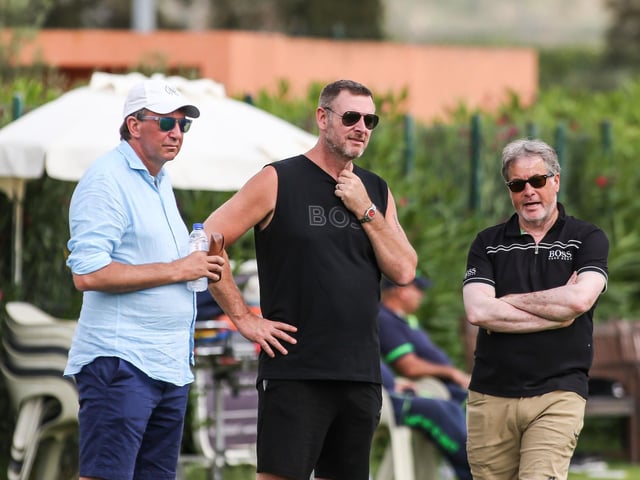 Posh co-owners, from left, Dr Jason Neale, Darragh MacAnthony and Stewart Thompson.