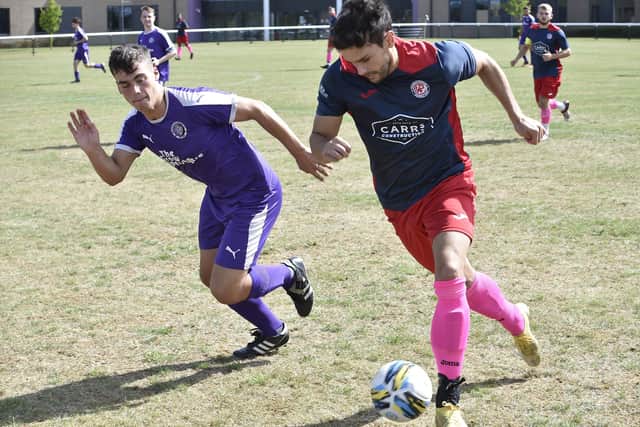 Action from Stanground Sports (purple) v Wittering Premiair at Stanground Academy. Photo: David Lowndes.