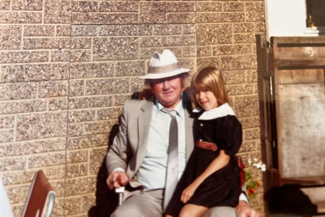 Catherine aged about 7 with her grandad, Ifor.