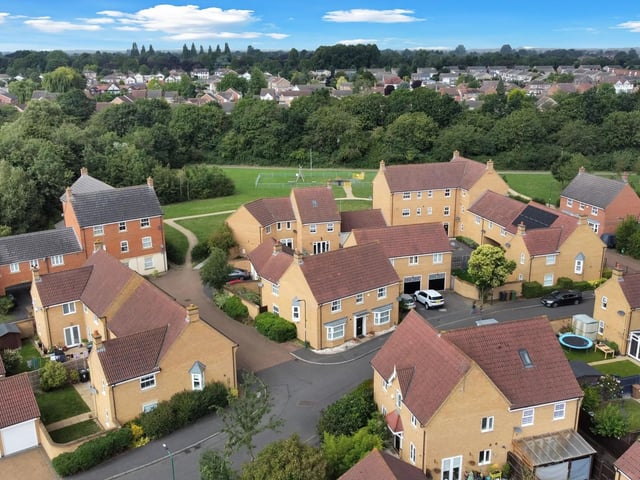 An aerial view of part of the estate with the house in the foreground