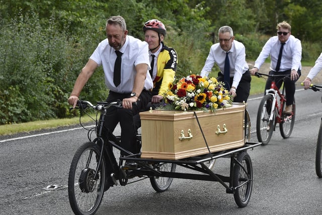 A specially converted tandem is used to bring the coffin of Raymond Pitchford to Peterborough Crematorium.