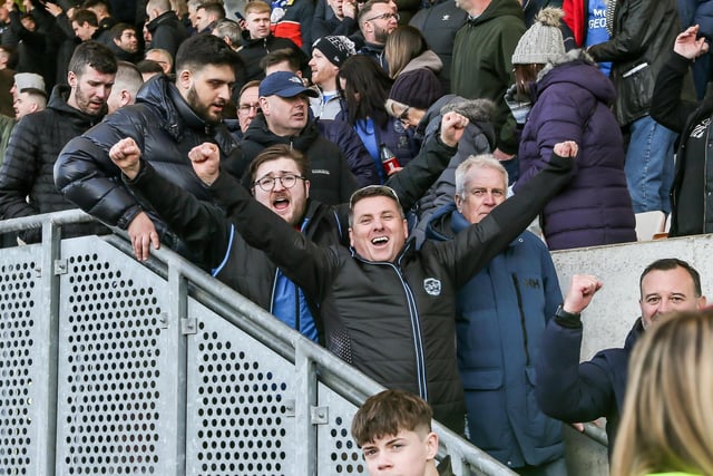 Peterborough United fans enjoy the win at Cambridge United.