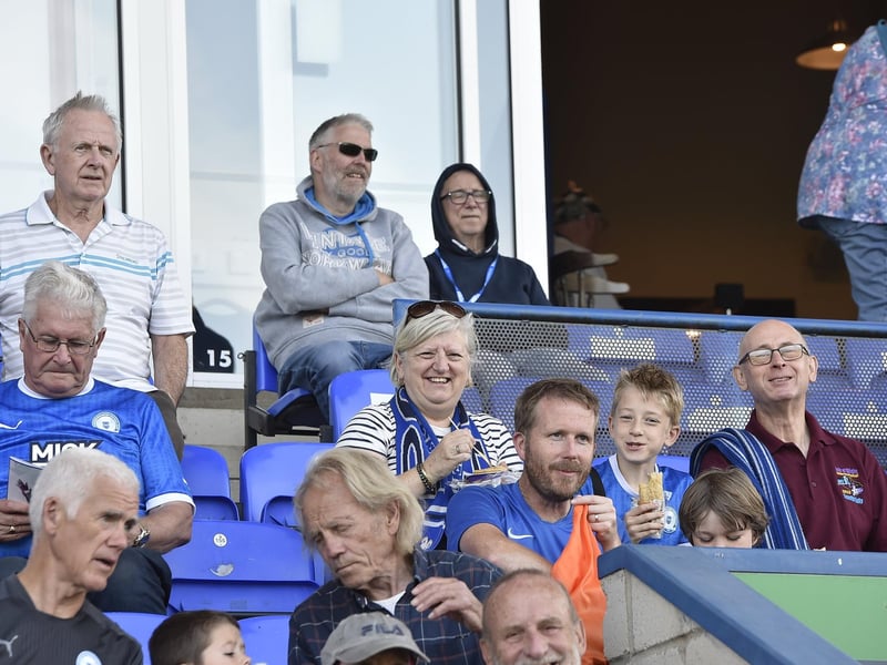 Peterborough United fans watch the draw with Leyton Orient.