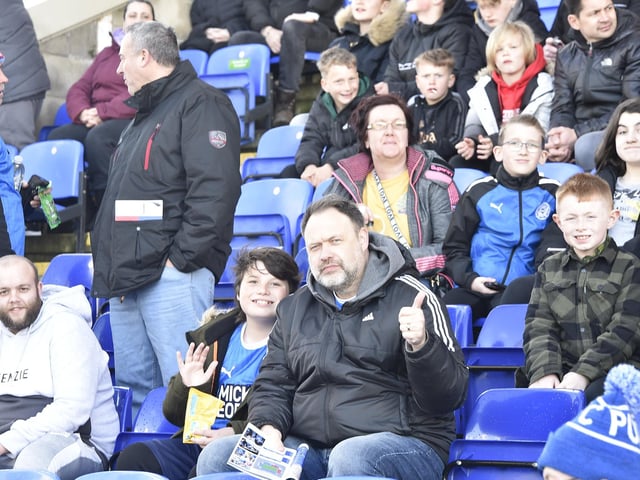 Peterborough United fans are pictured enjoying another home win.