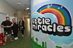 Louise Evans from Little Miracles with Andrew and Maria Thomas from AT Installations who were part of a charity team who renovated the Little Miracles building in a 12 hour dash.