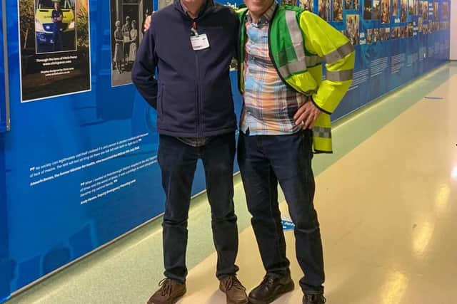 Graphic designer Chris Lane with amateur photographer Chris Porsz.