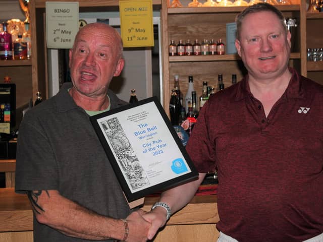 City Pub of the Year - the Blue Bell, Werrington. Pictured is licensee John Lawrence with Matt Mace