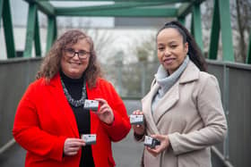 Nicola Jenkins & Anna Smith with the alarms handed out to residents.