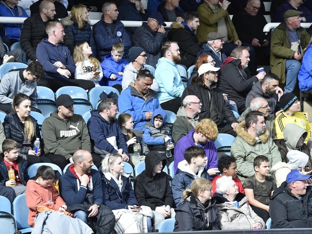 Peterborough United fans are pictured enjoying another home win.
