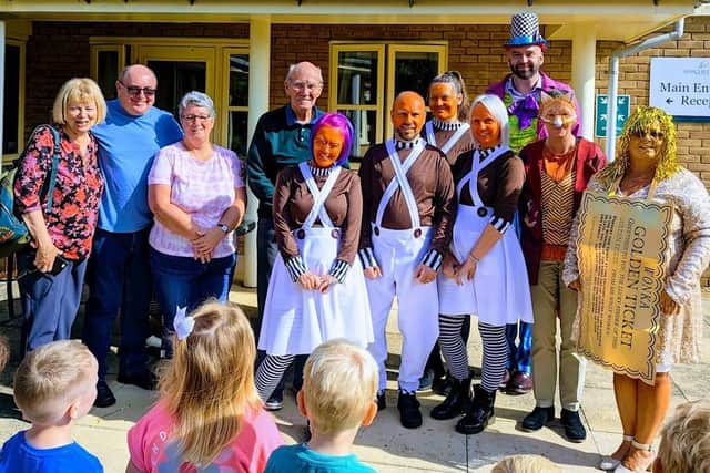 Staff members, residents and relatives celebrating Roald Dahl