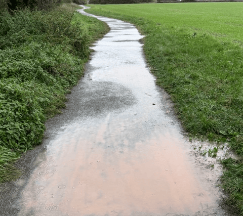 The flooded footpath in Peterborough