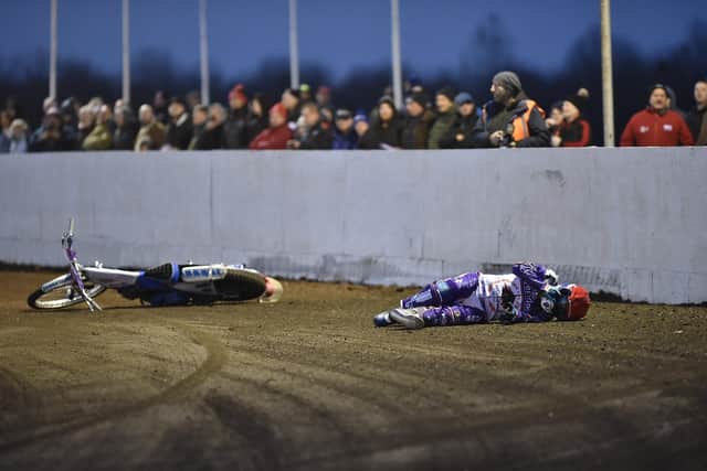 Nicki Pedersen crashes out of the Monday night meeting at the East of England Arean. Photo: David Lowndes.