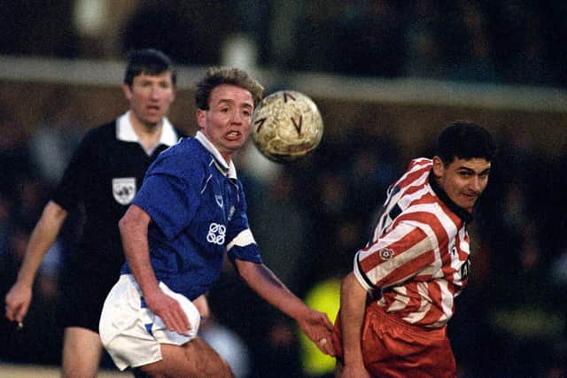 Mick Halsall (left) in action for Posh.