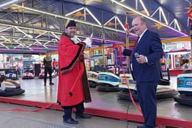 Mayor of Peterborough, Councillor Chris Harper, cuts the official ribbon