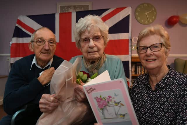 103-year-old Connie Giles celebrates her birthday at Werrington Lodge Care Home with her  daughter Carol Popple and   Ken Popple
