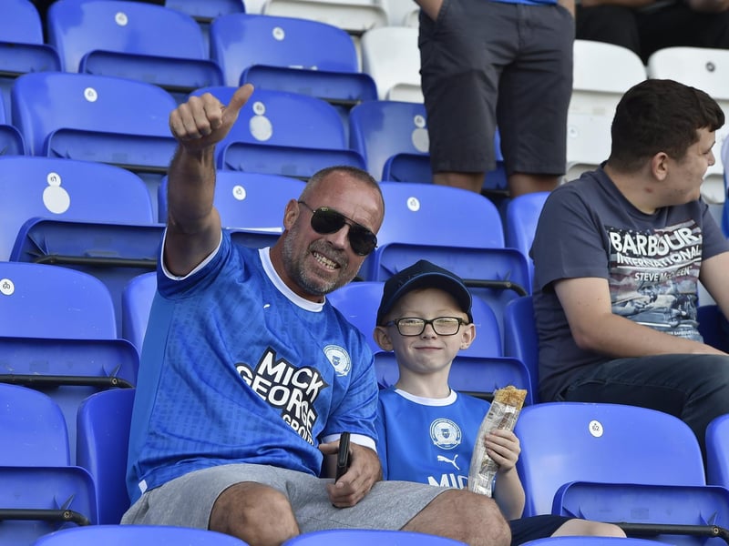 Peterborough United fans watch the draw with Leyton Orient.