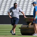 Gary Barwell (left) with England captain Joe Root. Photo by Paul Ellis AFP via Getty Images.