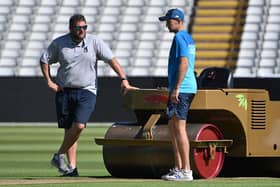 Gary Barwell (left) with England captain Joe Root. Photo by Paul Ellis AFP via Getty Images.