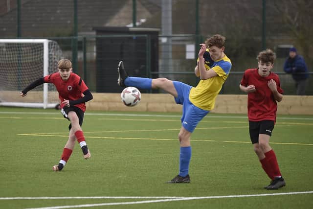 Action from Netherton Under 15s (red) v Ketton at the Grange. Photo: David Lowndes.