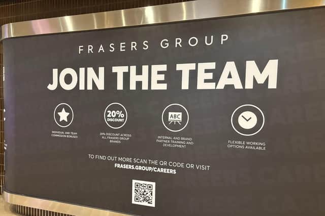 Frasers signs in the Queensgate Shopping Centre, Peterborough, urging people to join their team.