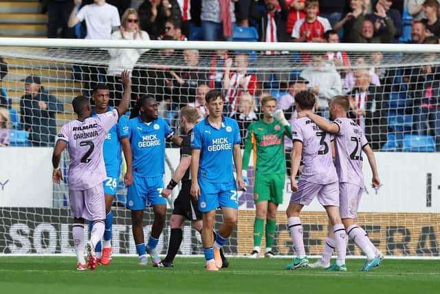 Lincoln City celebrate their third goal at Posh. Photo Joe Dent/theposh.com.