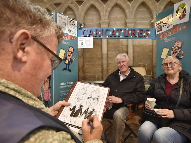 Cartoon artist John Elson