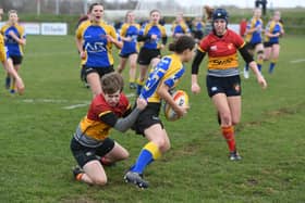 Maddie Hall attempts a tackle for Borough Under 16s against Market Bosworth. Photo: David Lowndes