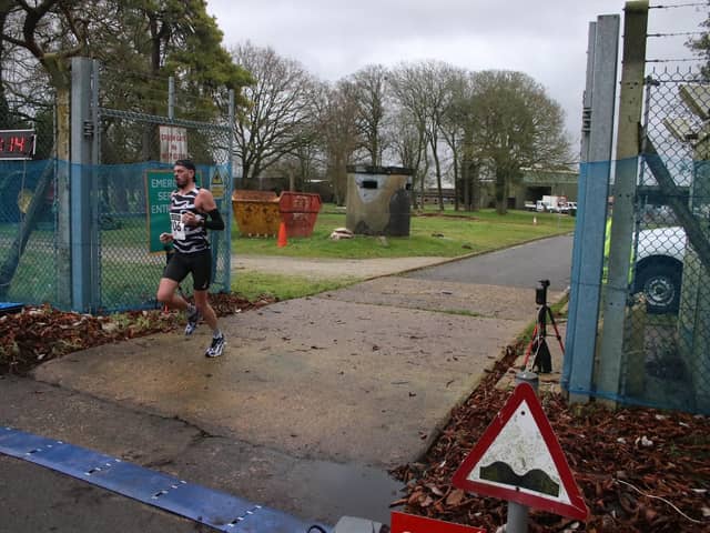 Phil Martin completes his second place finish at the Marham Flyers 10k.