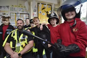 PC Gareth Price,  a safety in schools officer with some of the pupils.