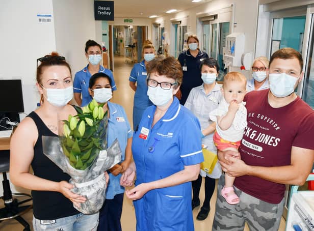 Nurse Claire Chapman with, from left, Monika and Mateusz and their daughter Emilia, who thanked the cardiology nurse for saving the life of Mateusz's father Miroslaw Dziadosz, (54) who collapsed in the street after a heart attack.