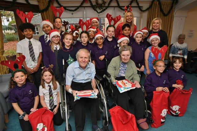 Pupils from Newark Hill primary school singing Christmas carols to residents at Park House nursing home.