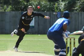 Daniel Oldham bowling for Peterborough Town seconds. Photo David Lowndes.