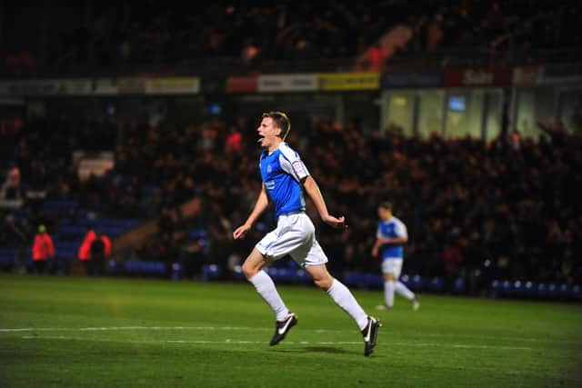 Ryan Bennett celebrates scoring for Posh against Barnsley in 2011. Photo: Alan Storer.