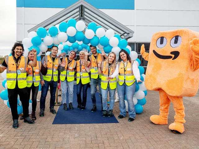 Staff celebrate the opening of Amazon's new distribution centre in Peterborough