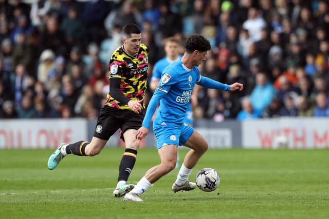 Joel Randall of Peterborough United gets away from his marker in the game against Carlisle. Photo Joe Dent/theposh.com.