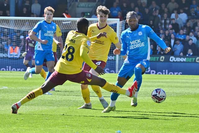 Tayo Edun in action for Posh against Cobblers. Photo David Lowndes.