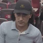 Image of a man British Transport Police wish to speak to in connection with luggage theft