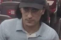 Image of a man British Transport Police wish to speak to in connection with luggage theft