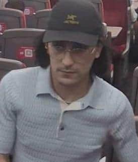 Image of a man British Transport Police wish to speak to in connection with luggage theft