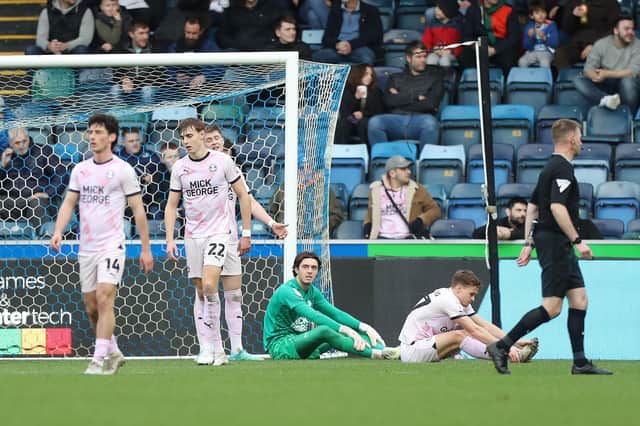 Disappointment for Posh players after Wycombe's second goal. Photo: Joe Dent/theposh.com